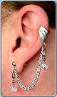 Single-pierced style shown w/cuff & clear aurora borealis beads