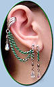 Single-pierced style shown w/cuff, green chain & clear AB teardrops