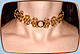 Steel-lace choker in brass